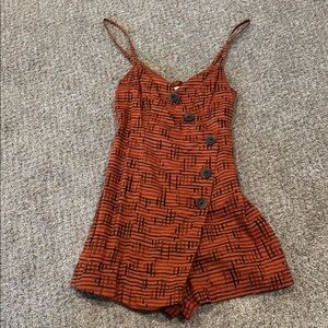 Trendy Orange and Black Romper